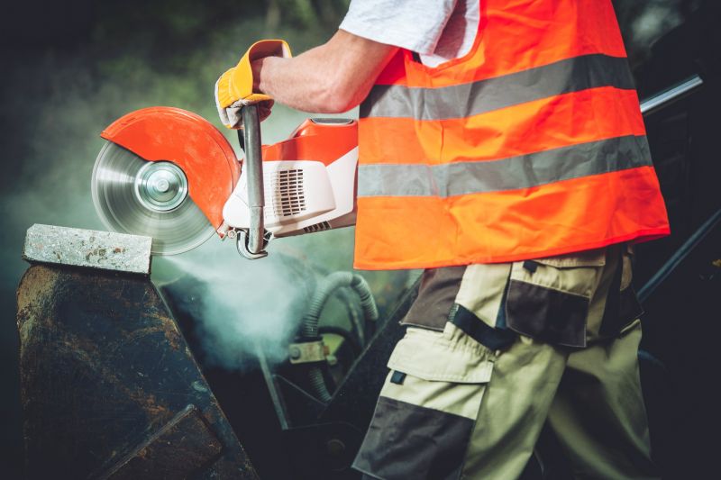 Workers Performing Concrete Cutting